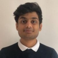 A professional headshot of Visakh